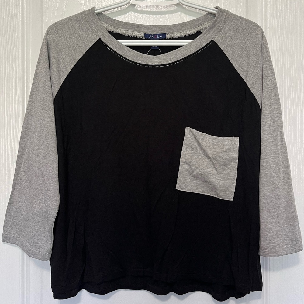 Black and grey mid sleeve baseball tee with front pocket